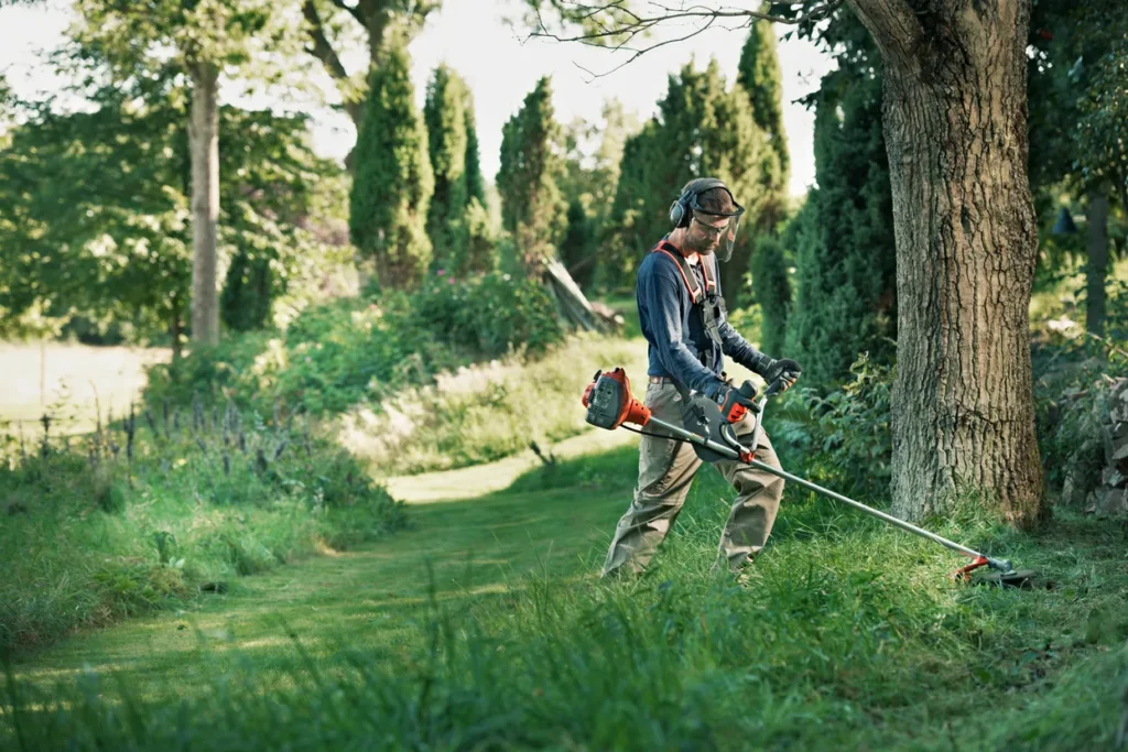 Husqvarna 122R med trimmerhoved
